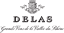 Delas
